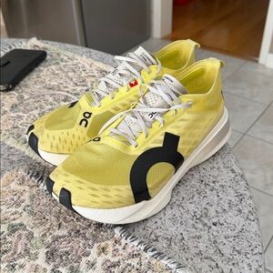 On Running Vibrant Yellow and Black Shoes